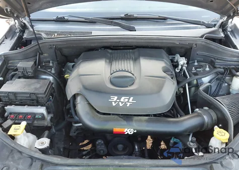 2013 Jeep Grand Cherokee Overland z USA, uszkodzony, nr VIN 1C4RJECG4DC588189